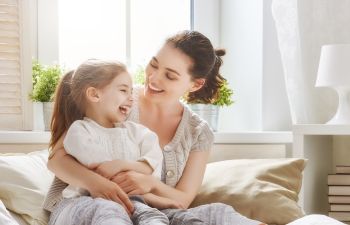 Mom and Daughter Laughing