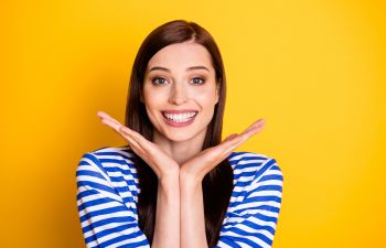 happy young woman with a perfect smile